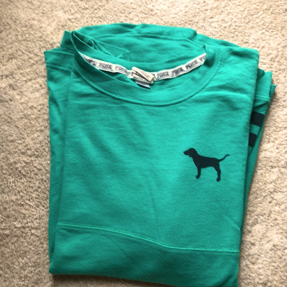 A green long sleeved Pink shirt. (It’s green)